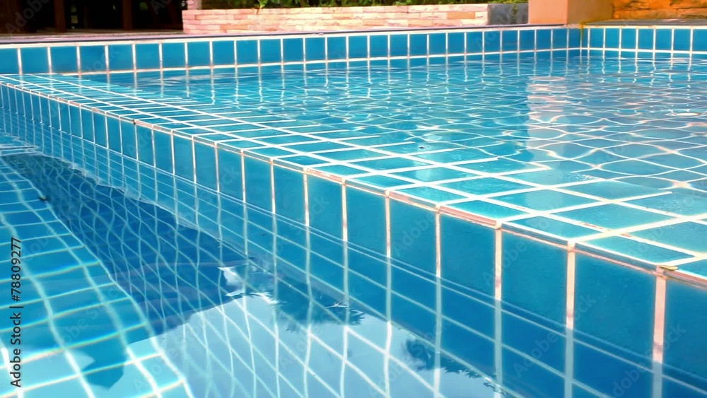 Clear blue swimming pool close up in tropical island at resort Clear blue swimming pool close up in tropical island at resort