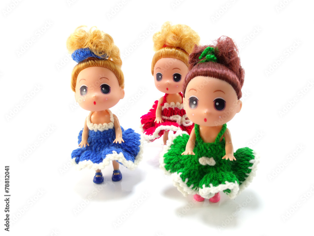 Fototapeta premium collectible baby girl cute doll with colorful knitting dress