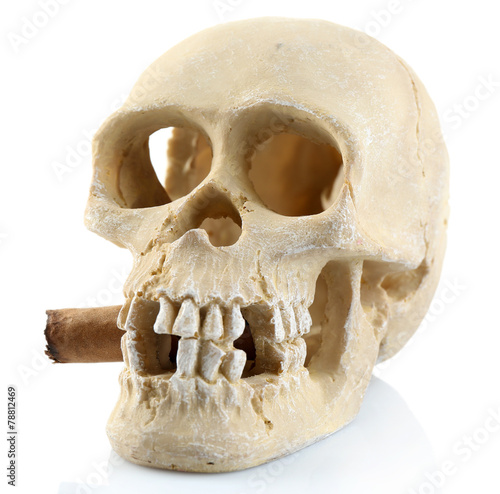 Smoking human scull with cigar in his mouth, isolated on white