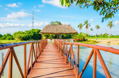 Canvas Print Wooden bridge on a beautiful lake, Vinales, Cuba