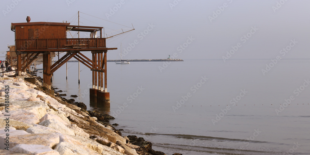 Fototapeta premium wooden stilt house on the seashore