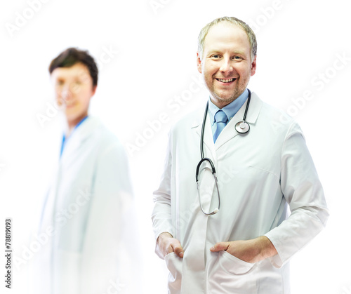 Doctor with stethoscope and nurse