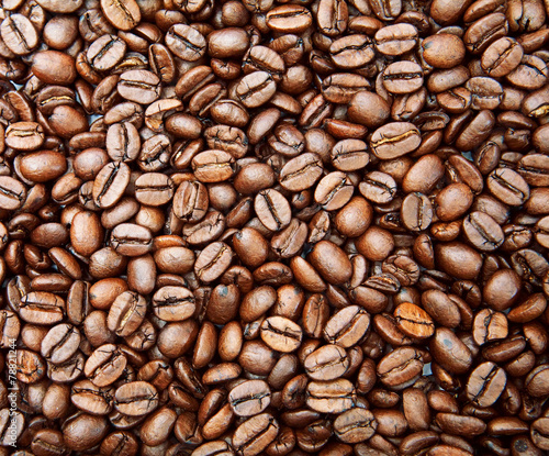 Photo of natural fried grains of coffee. 