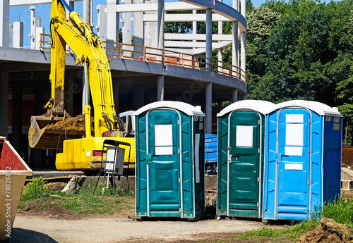 Portable toilets at the construction site photo