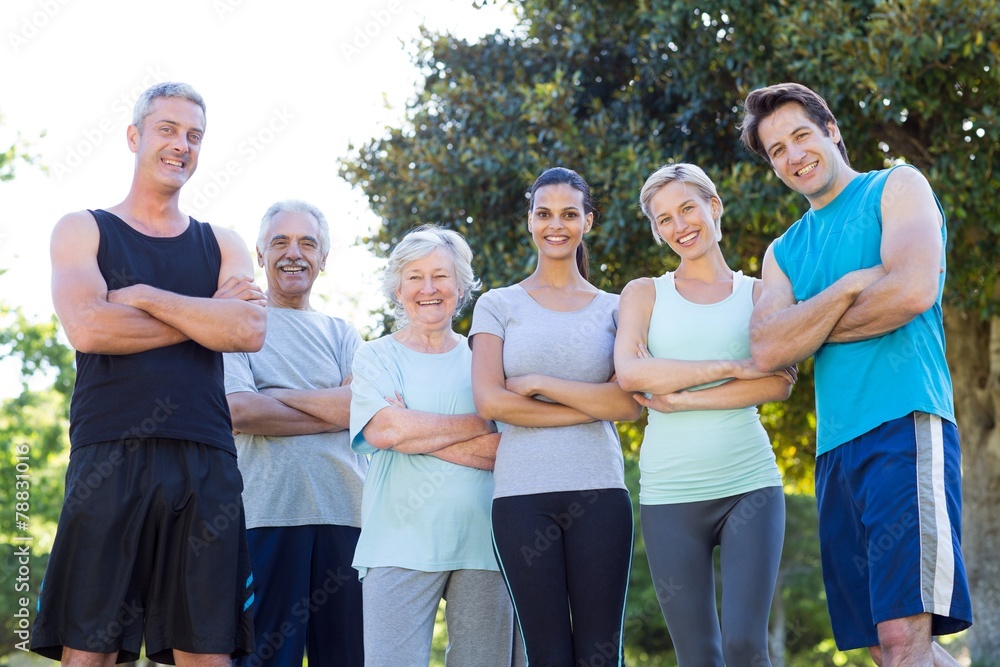 Happy athletic group smiling at camera