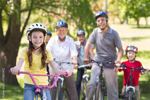 Happy family on their bike at the park