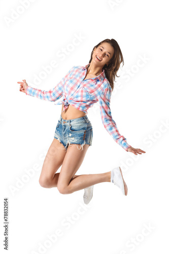 Happy Beautiful Jumping Smiling Girl On White Background