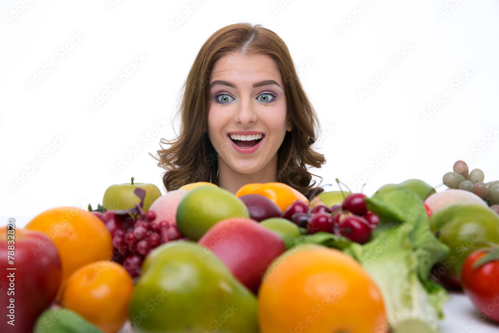 Portrait of a surprised woman looking at fruits Portrait of a surprised woman looking at fruits