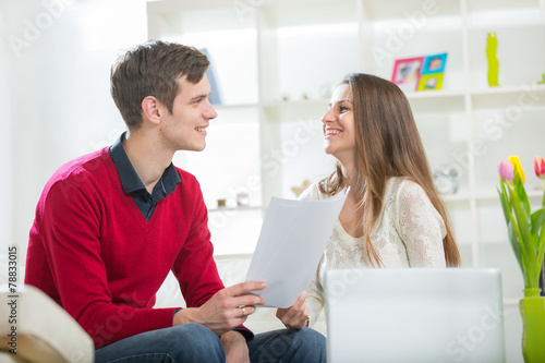 Εκτύπωση καμβά View of an Attractive couple doing administrative paperwork