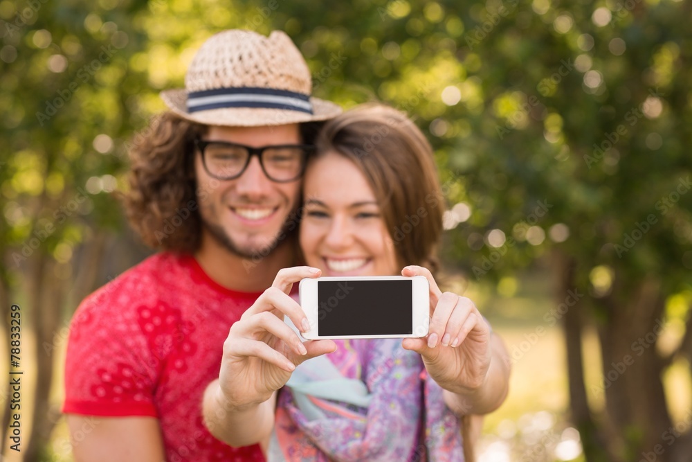 Friends taking a selfie in the park Friends taking a selfie in the park