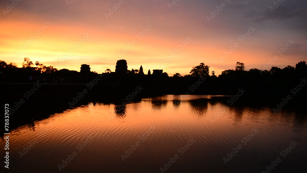 Silhouette of the Main Temple Buildings with Lake Reflection at Sunrise - Angkor Wat, Cambodia Silhouette of the Main Temple Buildings with Lake Reflection at Sunrise - Angkor Wat, Cambodia