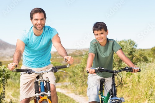 Father and son on a bike ride