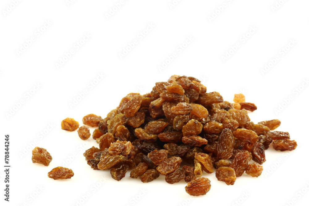 bunch of raisins on a white background bunch of raisins on a white background