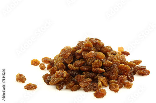 bunch of raisins on a white background