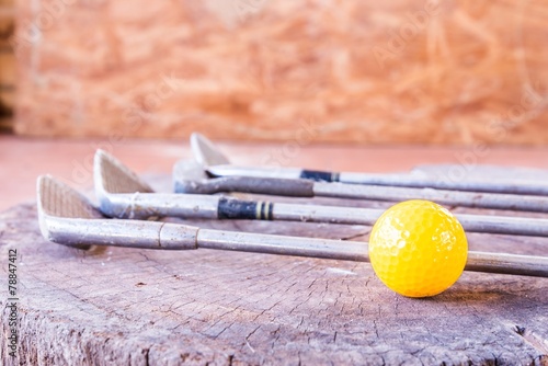 Still life Yellow Miniature Golf Ball On White Background.