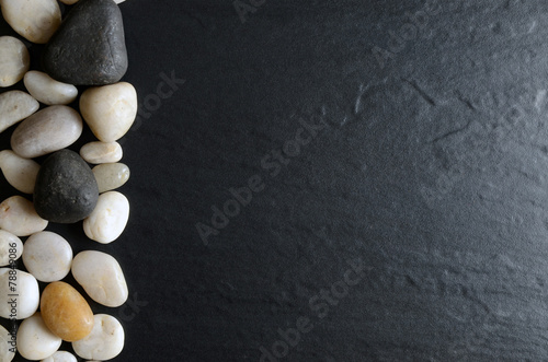 Small pebbles on a dark background