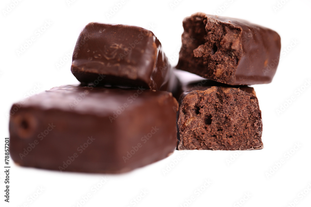 Broken chocolate bar on a white background Broken chocolate bar on a white background