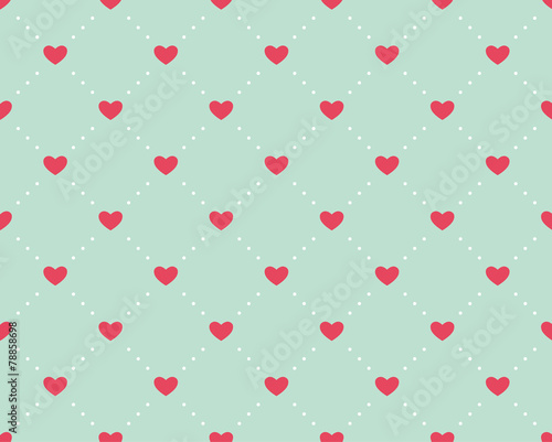 Seamless pattern of hearts on a light green background