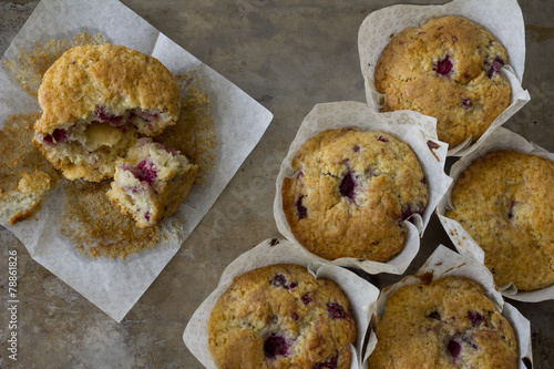 Raspberry Muffins from Above with one Eaten