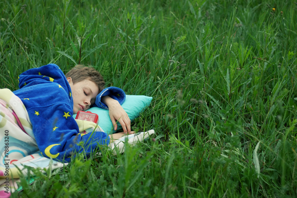 girl sleeping in the grass