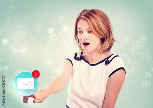 Young woman pointing at email icon