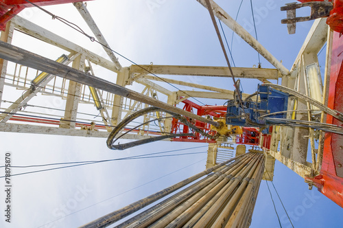 Drilling rig against the blue sky