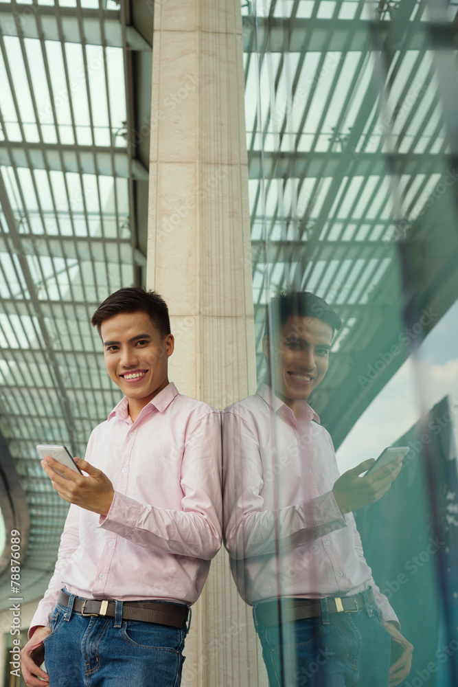 Cheerful man with smartphone Cheerful man with smartphone