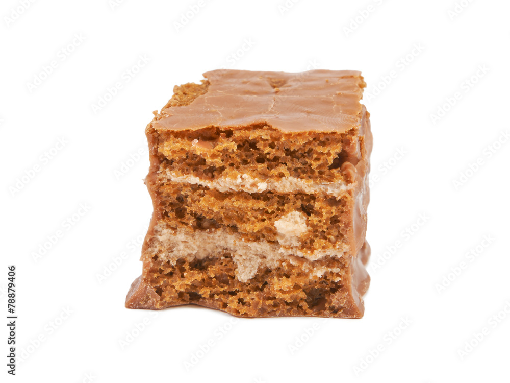 The broken pieces of chocolate biscuit isolated on white The broken pieces of chocolate biscuit isolated on white