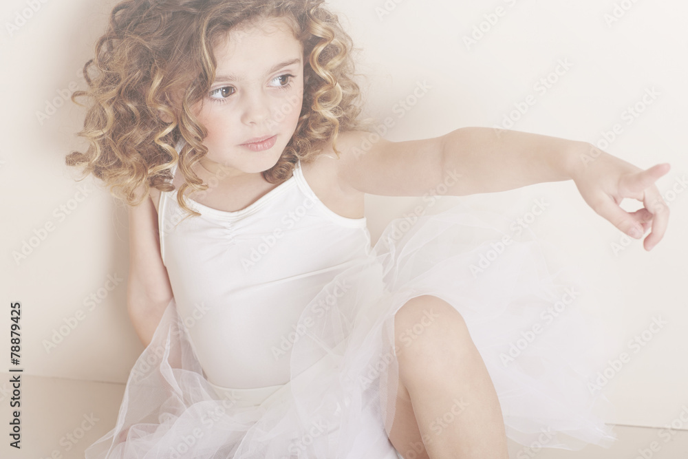 Young girl pointing in studio Young girl pointing in studio