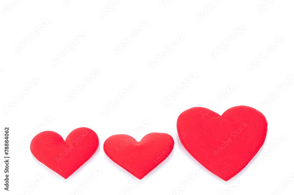 Red hearts on white background