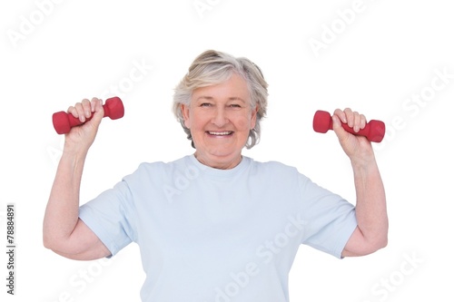 Senior woman lifting hand weights