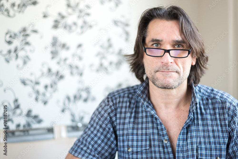 Portrait of a middle-aged man with glasses Portrait of a middle-aged man with glasses
