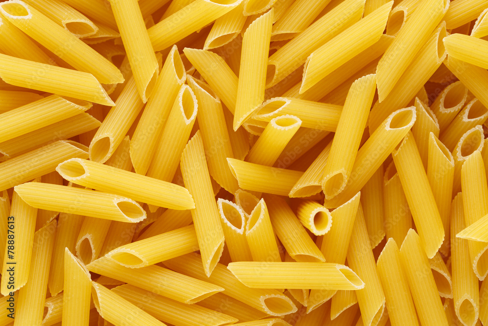 Backgrund of italian penne rigate pasta Backgrund of italian penne rigate pasta