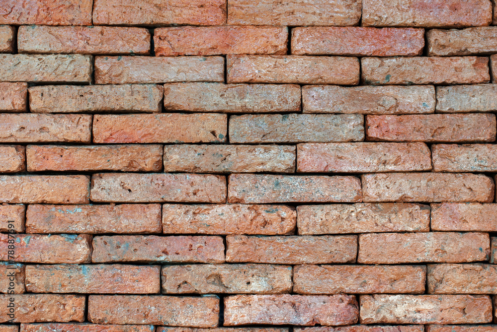 Fototapeta premium Porous red bricklaying without filling with cement