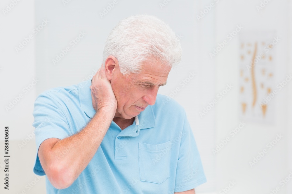 Senior man suffering from neck ache Senior man suffering from neck ache
