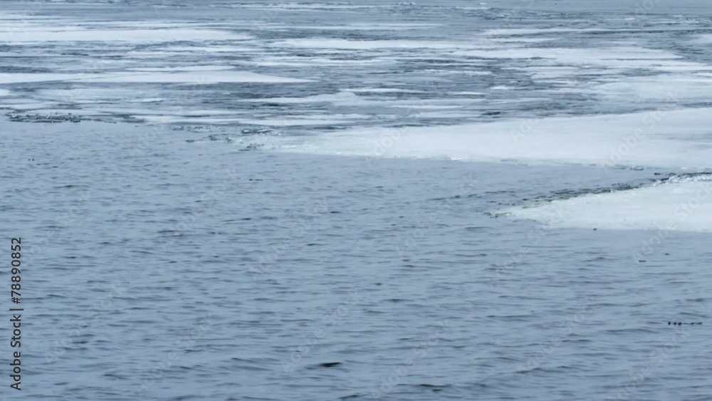 Panning. Timelapse of water waves on partly frozen lake Panning. Timelapse of water waves on partly frozen lake