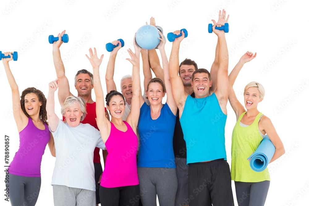 Fototapeta premium Excited people with exercise equipment raising hands