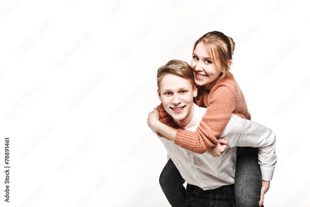 happy couple teenagers in studio happy couple teenagers in studio