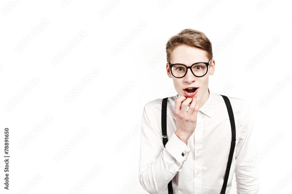 young man in glasses surprises and shock young man in glasses surprises and shock