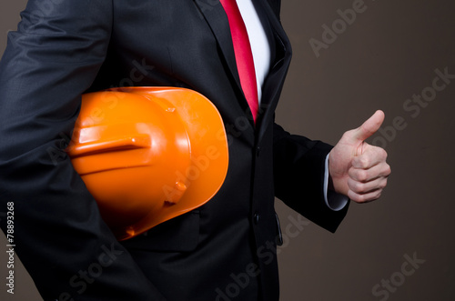 Men in suit with safety helmet photo