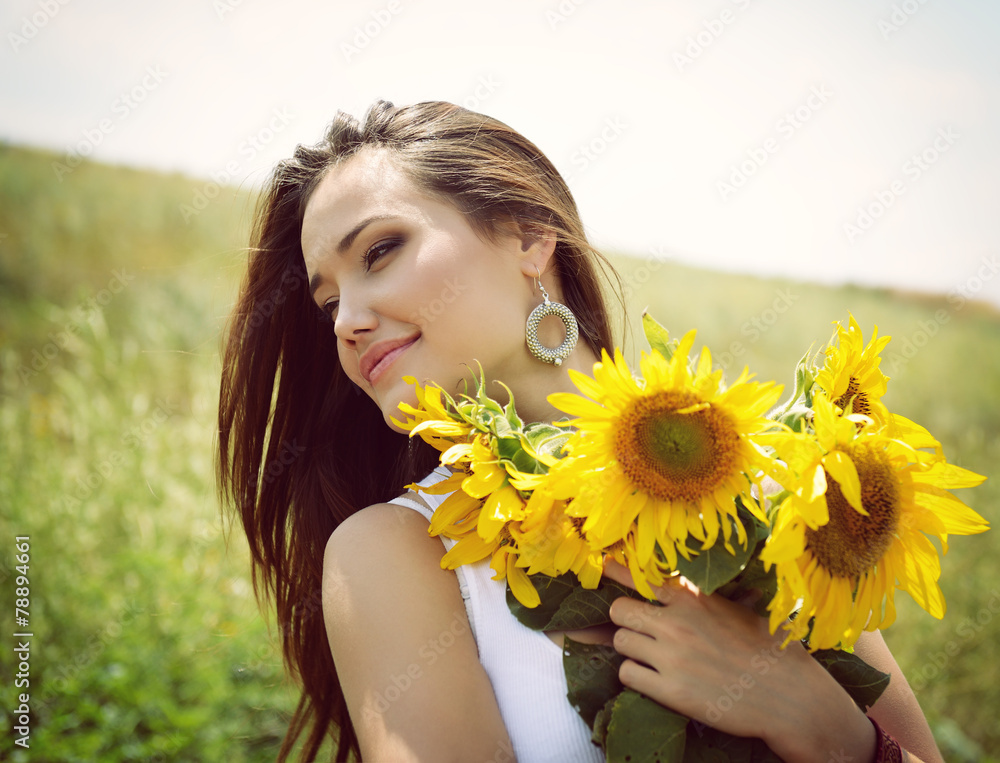Young beautiful woman enjoying summer, youth and freedom, holdin Young beautiful woman enjoying summer, youth and freedom, holdin