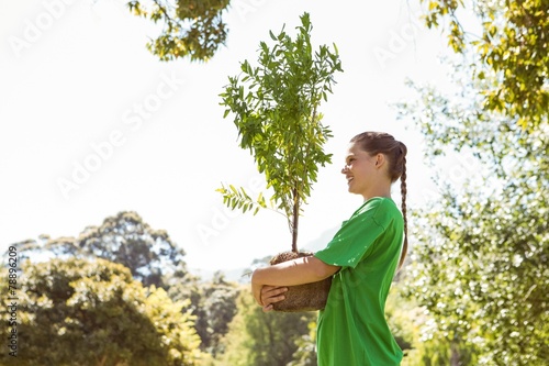 Environmental activist about to plant tree