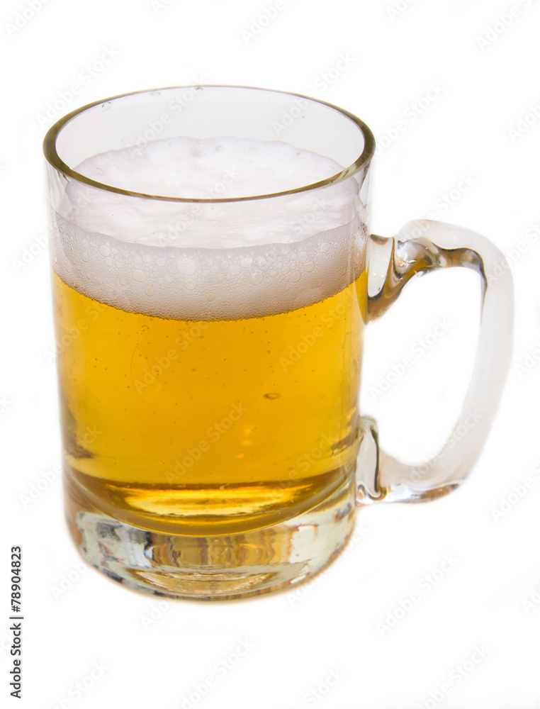 Mug of beer with froth over white background Mug of beer with froth over white background