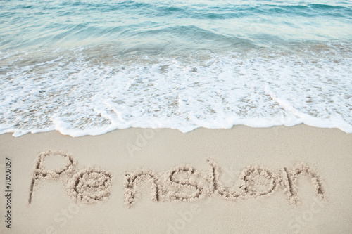 Pension Written On Sand By Sea photo