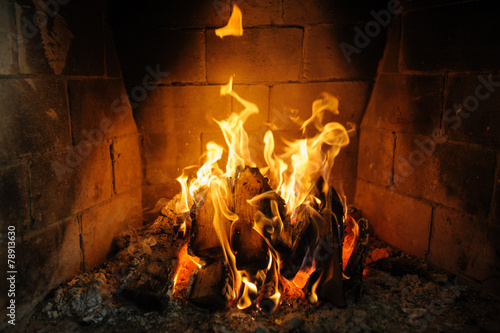 fire in fireplace and flames dance