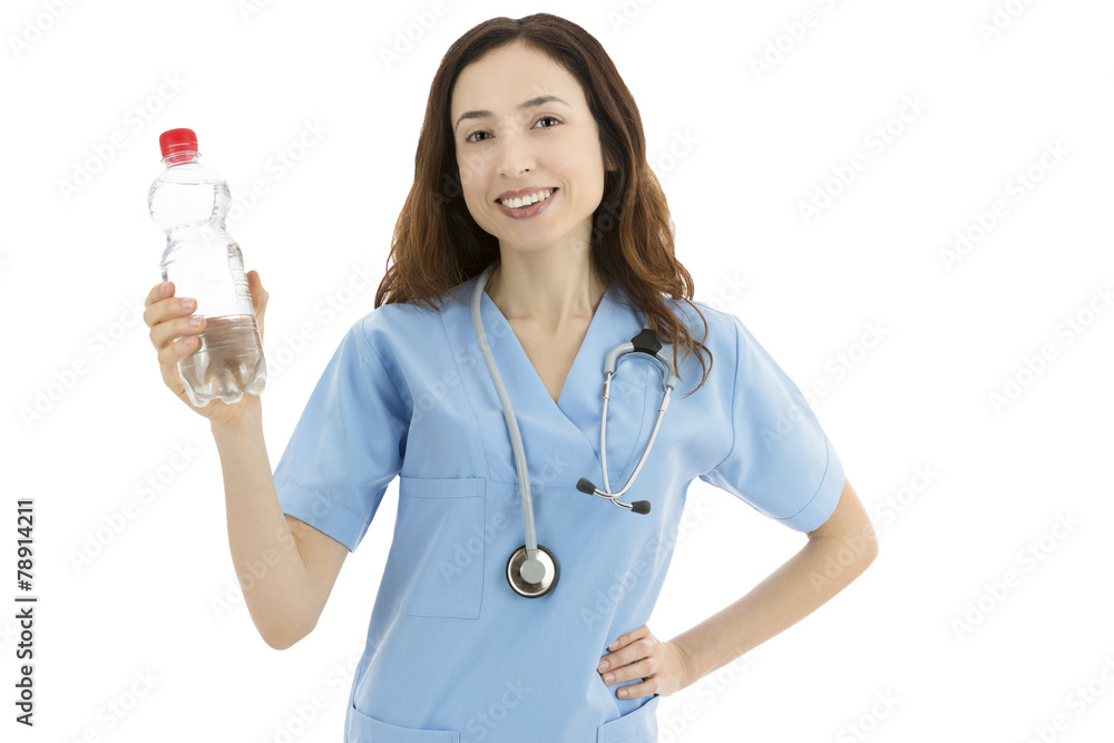 Friendly smiling female nurse or doctor offering a water bottle Friendly smiling female nurse or doctor offering a water bottle