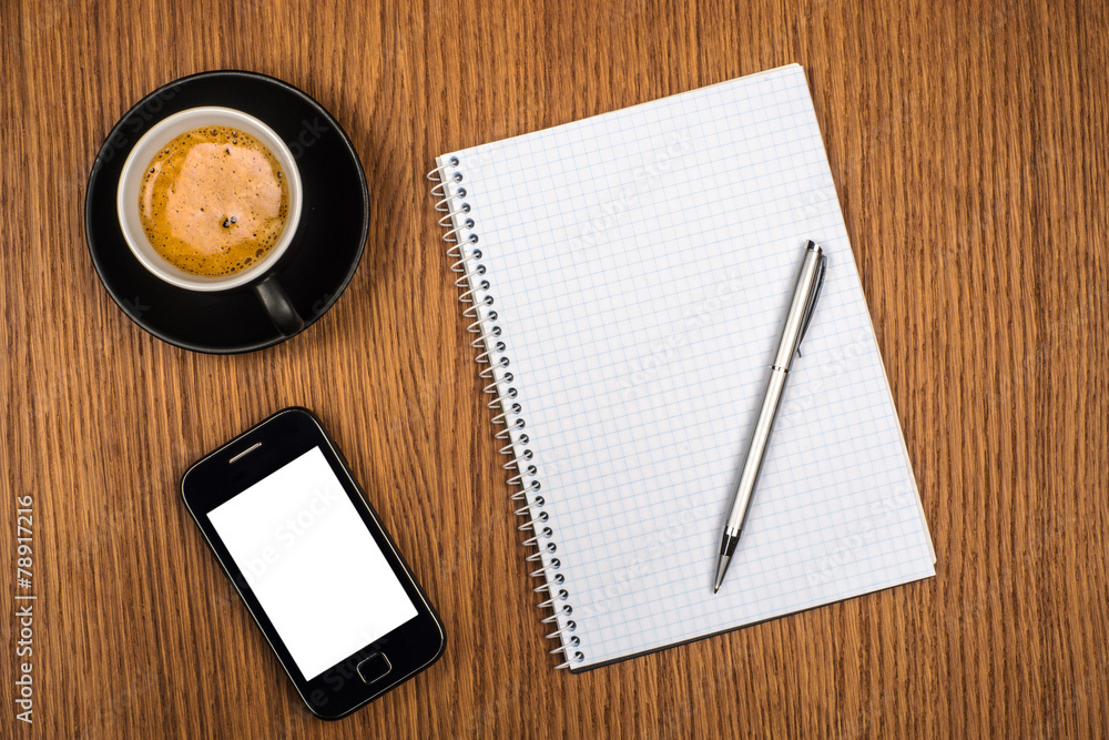 coffee with blank notebook and phone coffee with blank notebook and phone