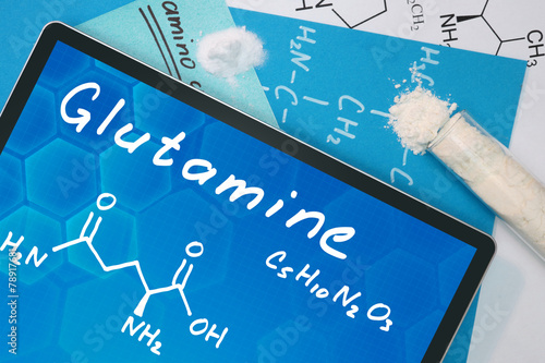 Tablet with the chemical formula of Glutamine  . Amino acids. photo