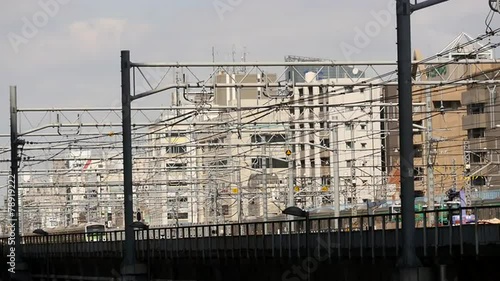 Wallpaper Mural Train Passes over Bridge in Central Tokyo Japan Daytime Torontodigital.ca