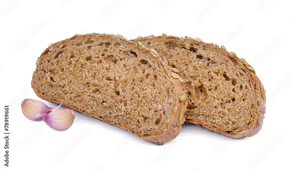 Grain bread and garlic isolated on white background. Grain bread and garlic isolated on white background.